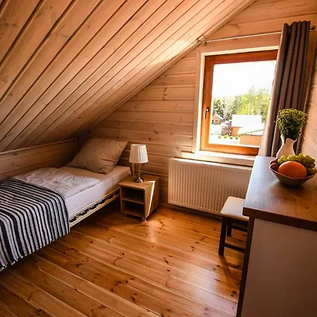 Gosciniec Echo Drewniane Caloroczne