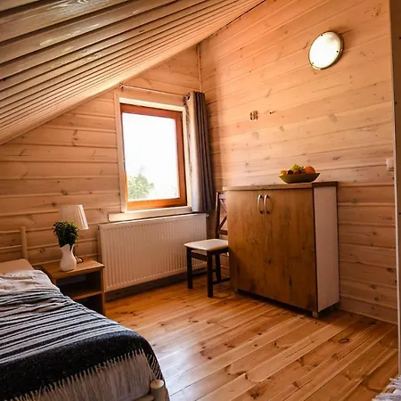 Gosciniec Echo Drewniane Caloroczne *